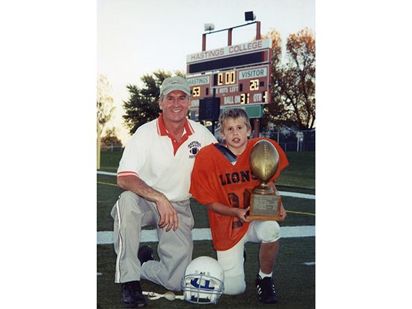 Sen. Dave Murman and his son Chase after winning a football championship in 2003.