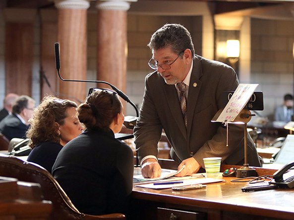 Sens. Jana Hughes, Danielle Conrad and Dan Lonowski